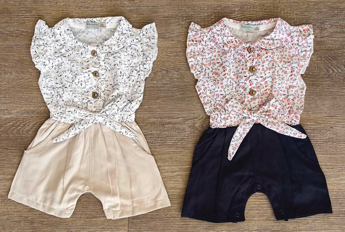 Barboteuse fleurie bébé fille coloris marine