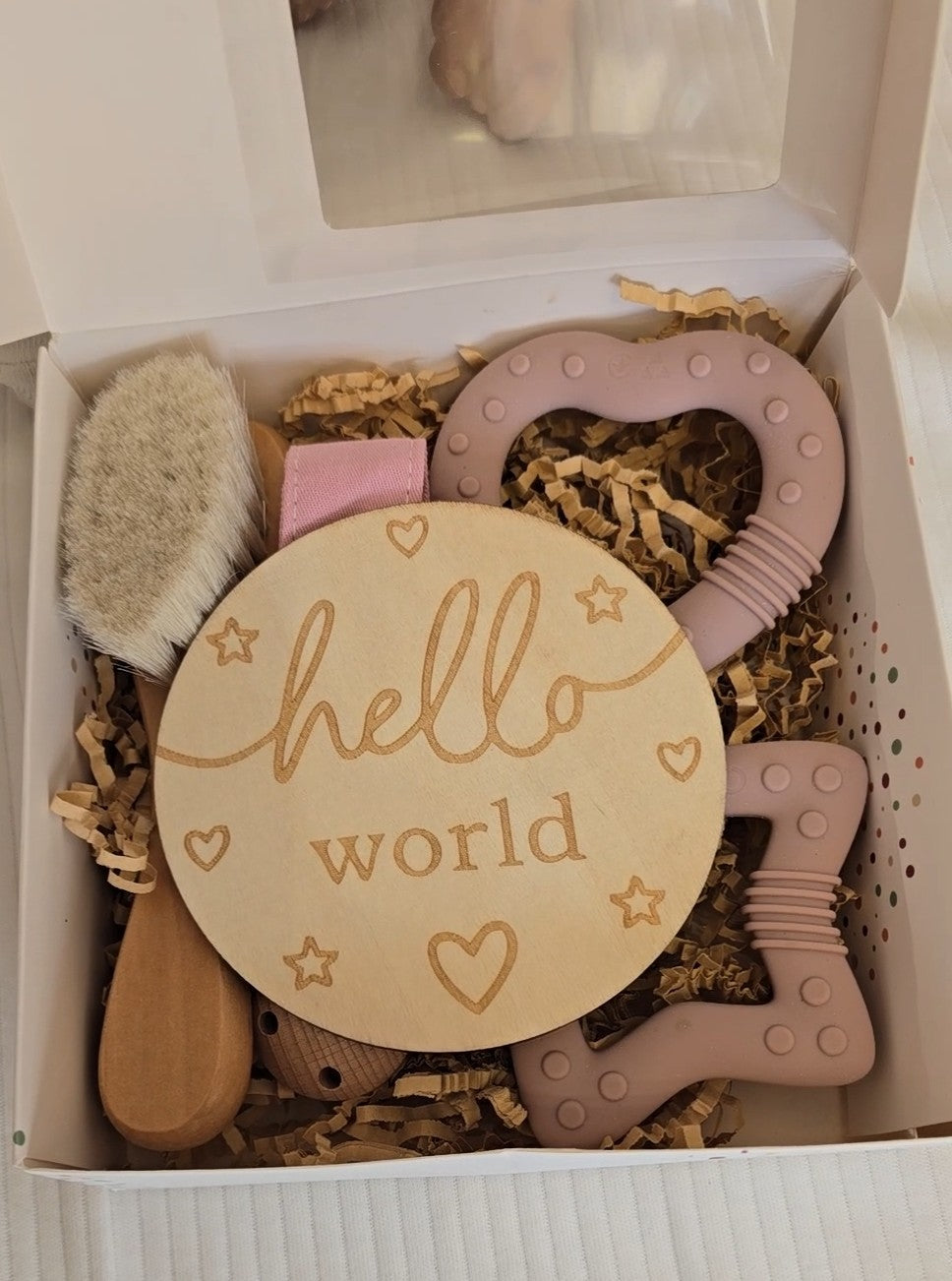 Détail coffret accessoires bébé fille rose