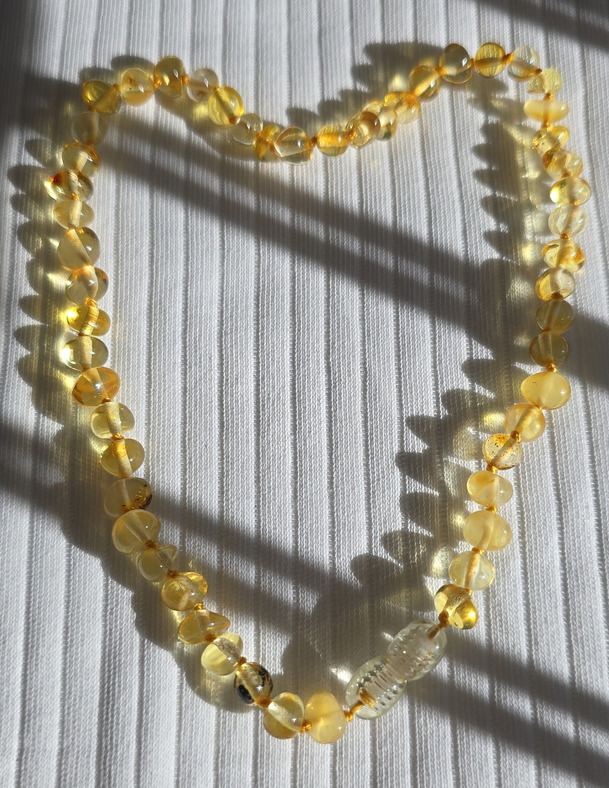 Collier bébé en ambre naturel de la Baltique 32 cm