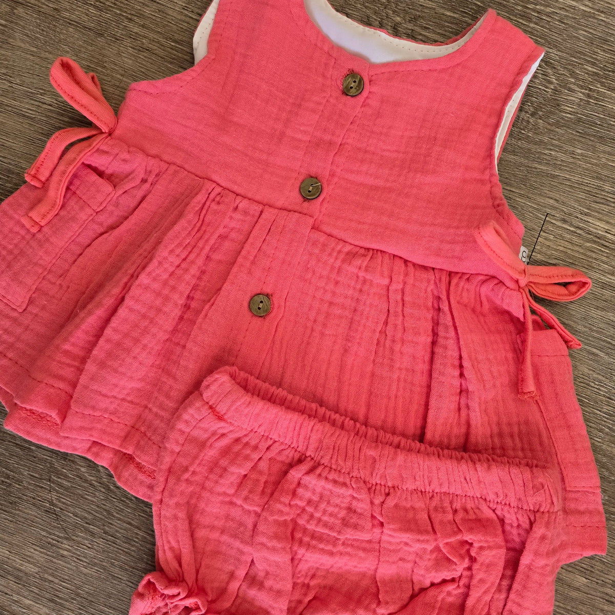 Tenue bébé fille fuchsia haut et bloomer