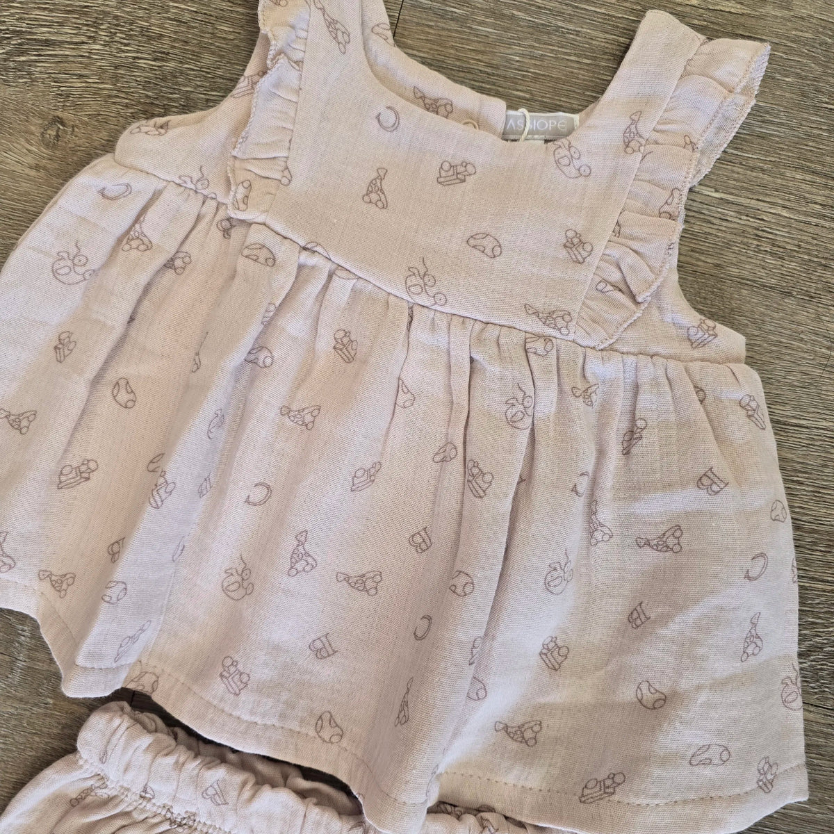 Tenue été bébé fille en gaze de coton avec haut à volants et bloomer